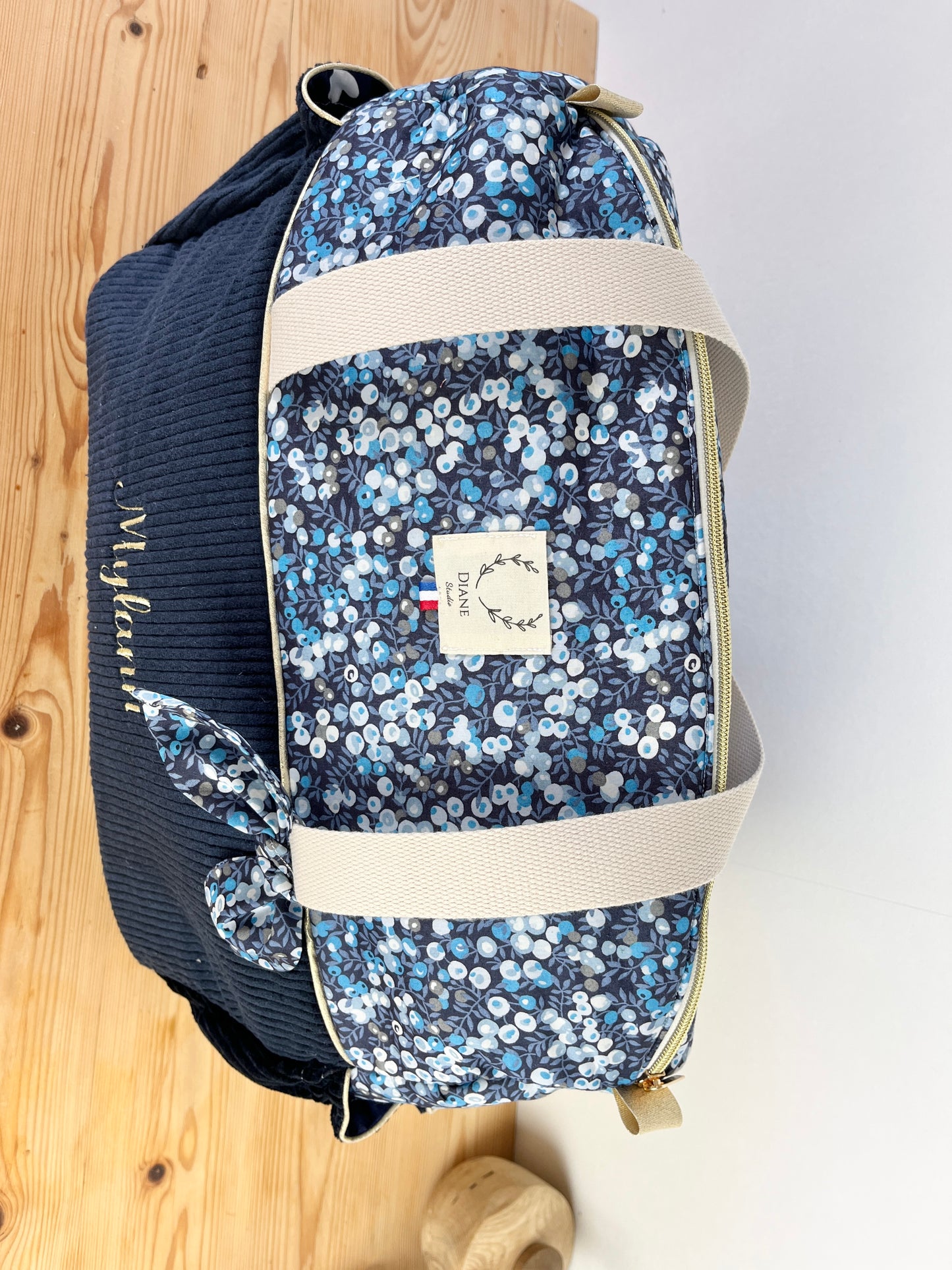 Aimé le sac à langer bleu marine et Liberty of London