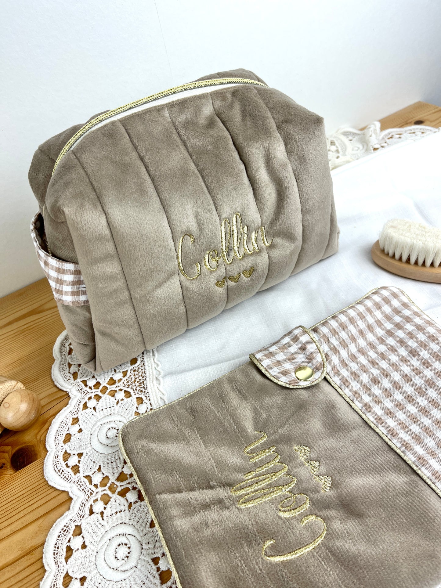 Set includes: Toiletry bag, blanket, doll, notebook cover, and bonnet