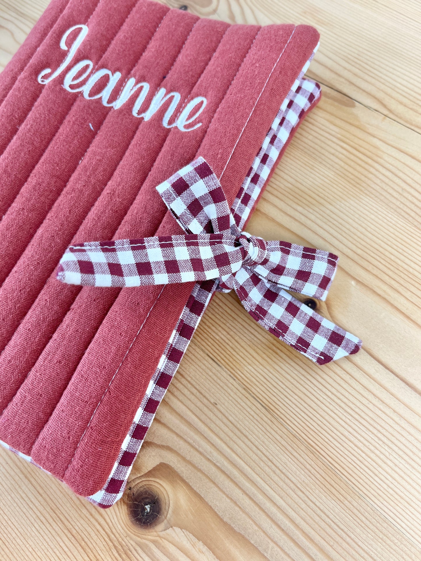 Noah the brick-red notebook cover