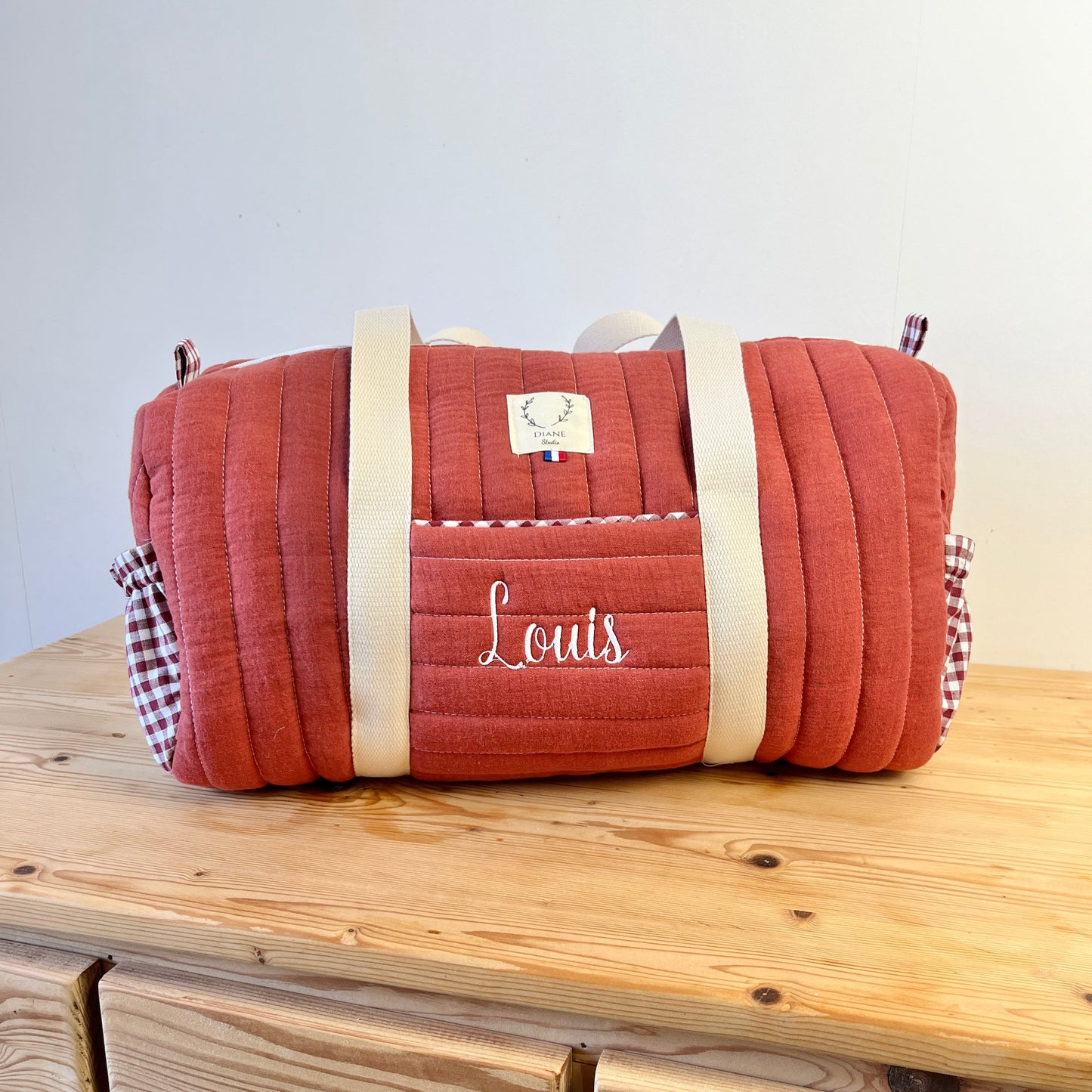 Léon le sac polochon enfant brique