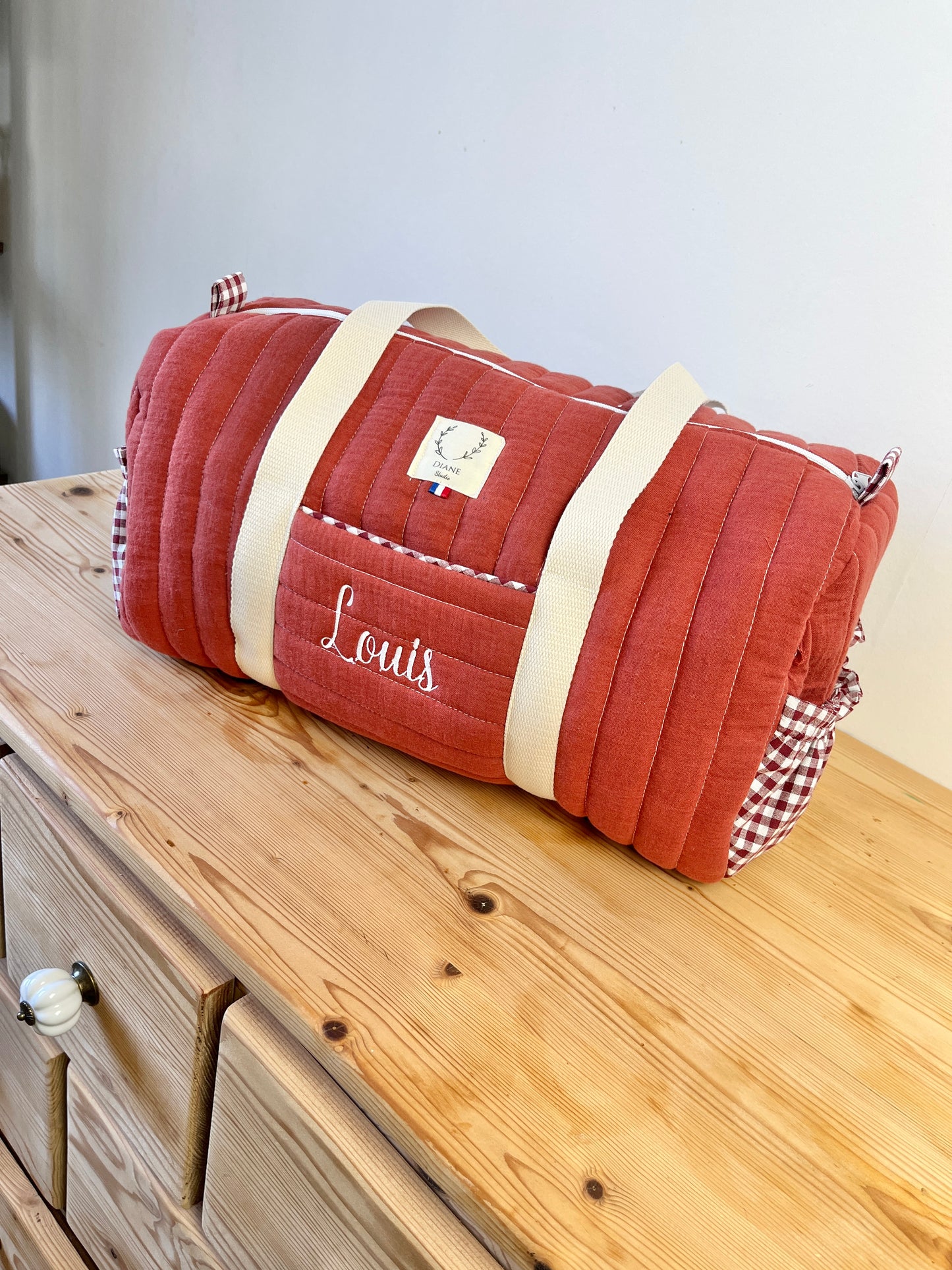 Léon le sac polochon enfant brique