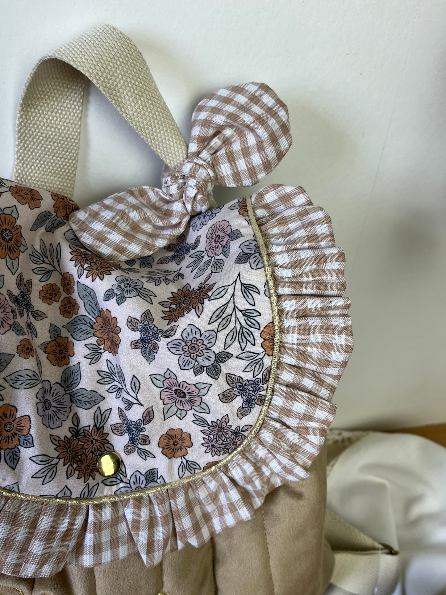 The Eglantine camel velvet backpack and Marion
