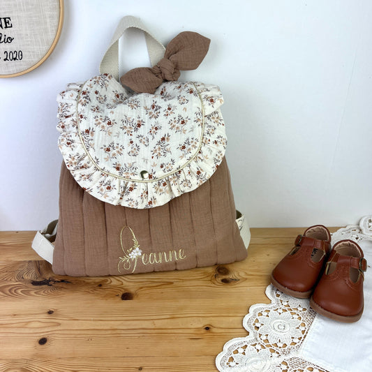The Eglantine camel velvet backpack and Marion