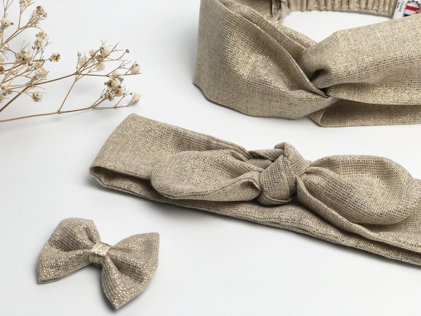 Headband croisé pailleté doré