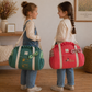 Louison the children's duffel bag with initial lace