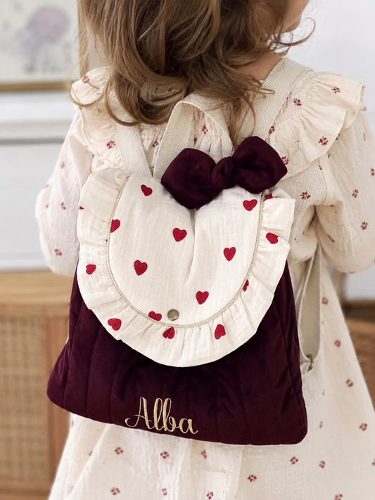 The Eglantine camel velvet backpack and Marion