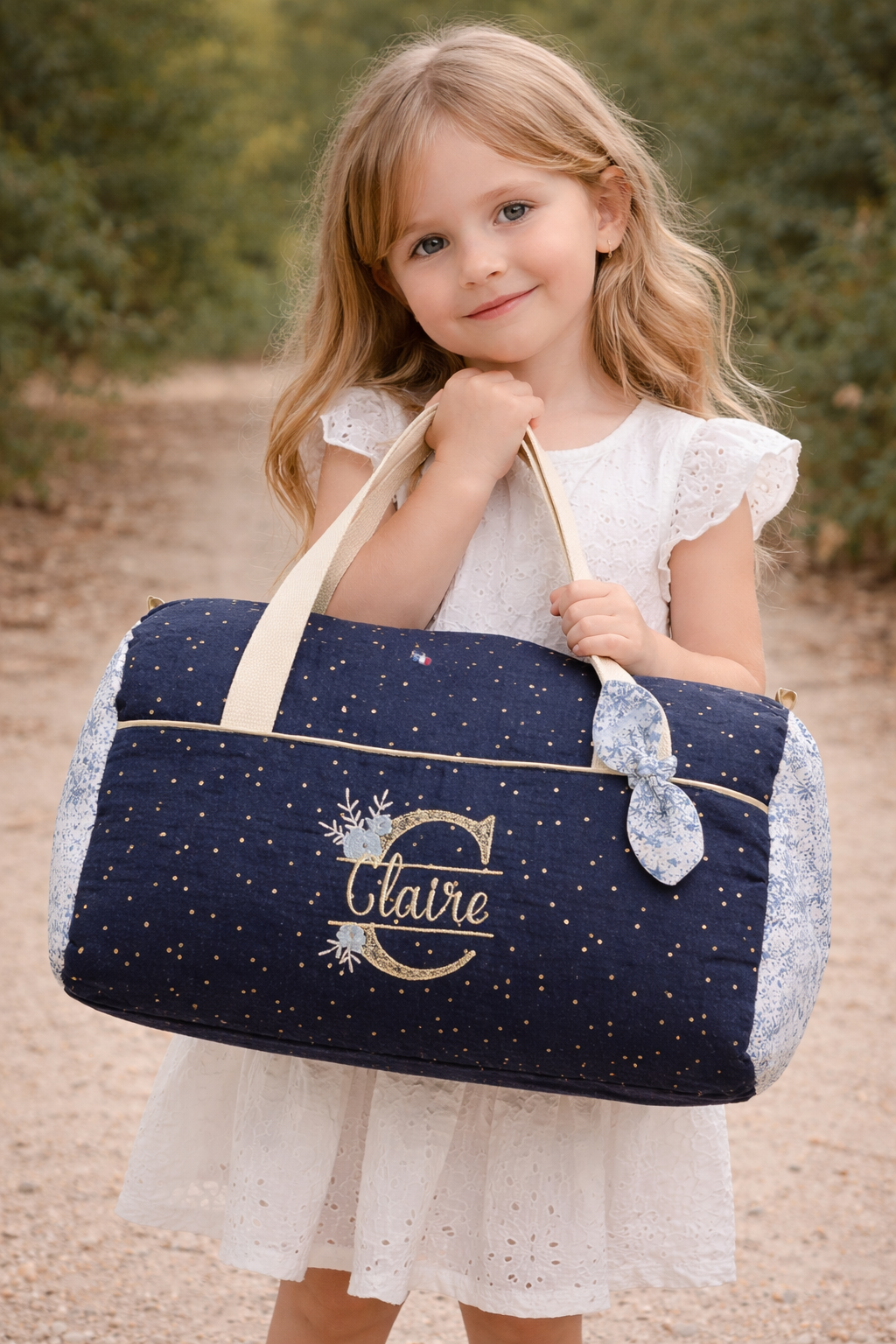 Louison le sac polochon brodé en Liberty of London