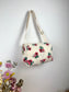 Prototype sac Colette souple en sherpa fleuri fushia gansé de biais