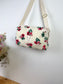 Prototype sac Colette souple en sherpa fleuri fushia gansé de biais
