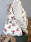 Prototype sac Colette souple en sherpa fleuri fushia gansé de biais