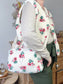 Prototype sac Colette souple en sherpa fleuri fushia gansé de biais