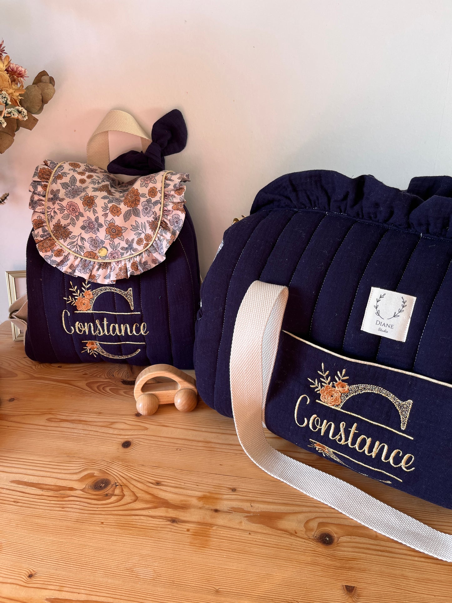 Louison le sac polochon bleu nuit et marion camel