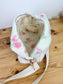 Prototype sac Colettesouple en sherpa fleuri pastel gansé de biais