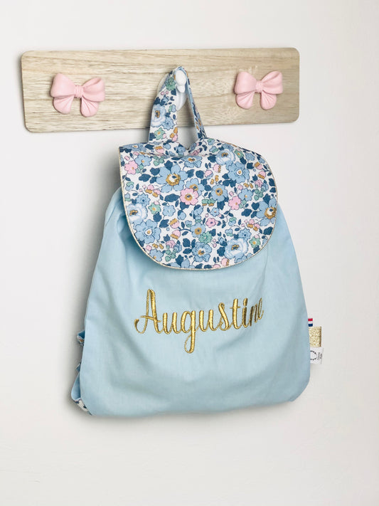 Le sac à dos enfant personnalisé Églantine gabardine bleu ciel et Liberty esclusif betsy denim