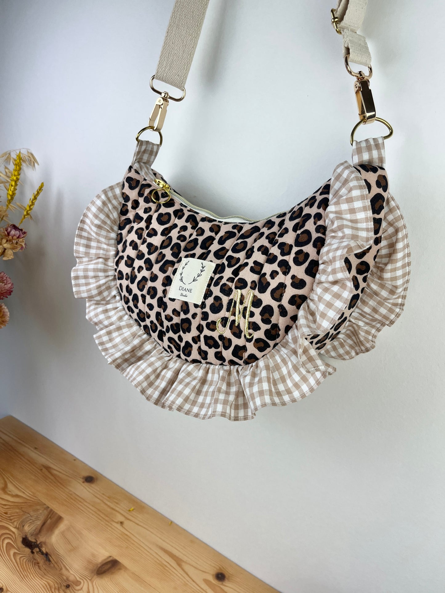 Milan le sac croissant matelassé léopard et vichy beige