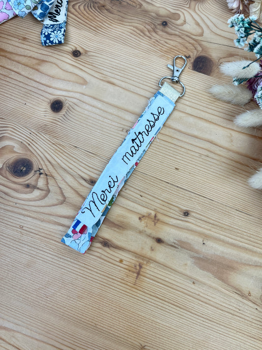 Porte clé merci maîtresse Betsy porcelaine
