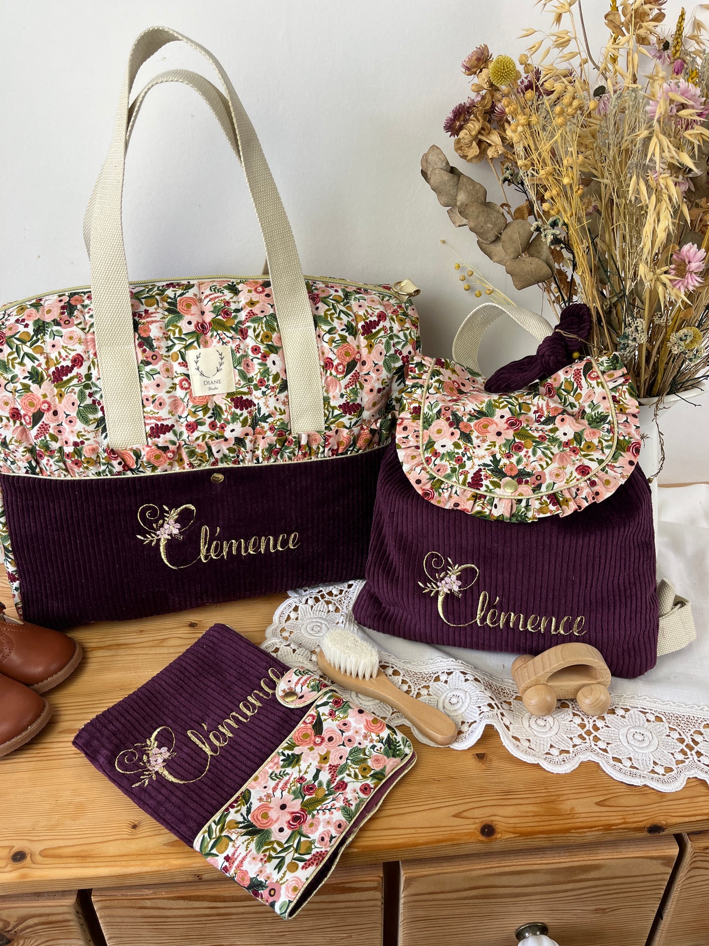 Ensemble : sac à langer/voyage, protège carnet et sac à dos Eglantine