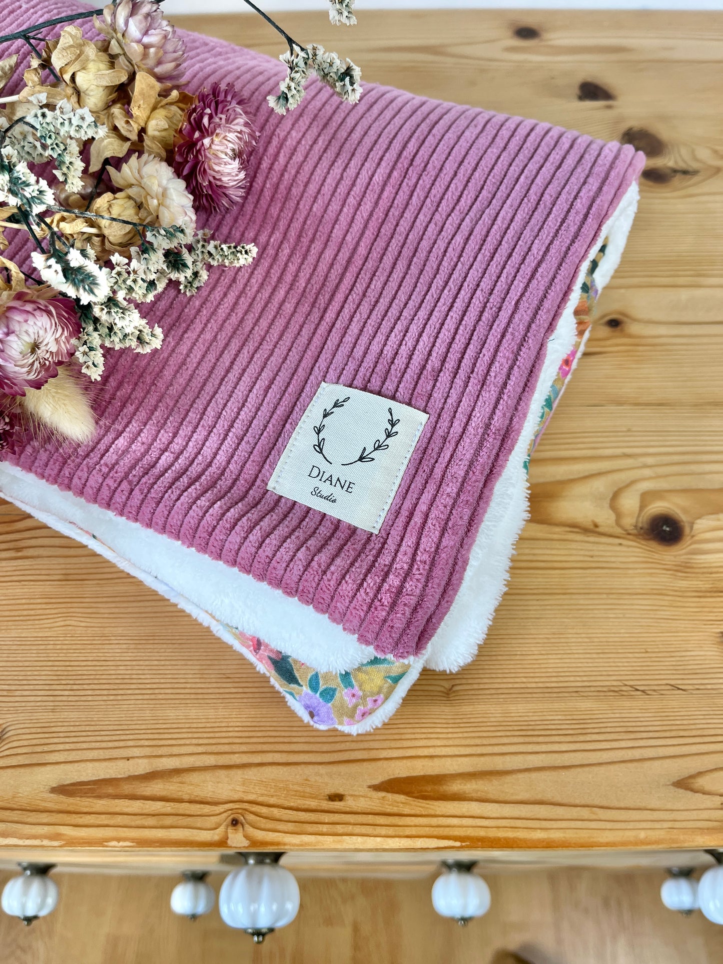 La couverture velours rose thé et bloom mandarine