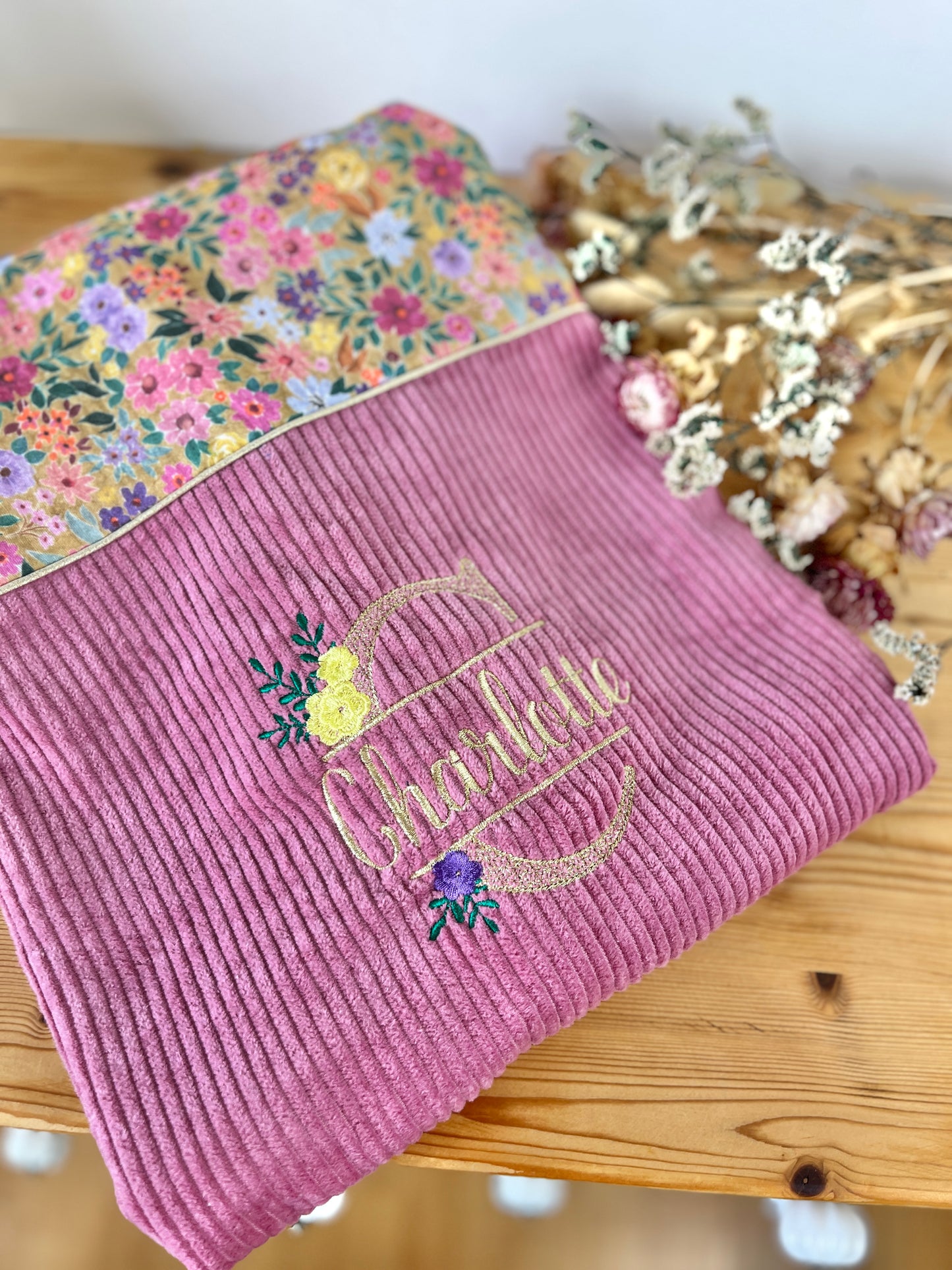 La couverture velours rose thé et bloom mandarine