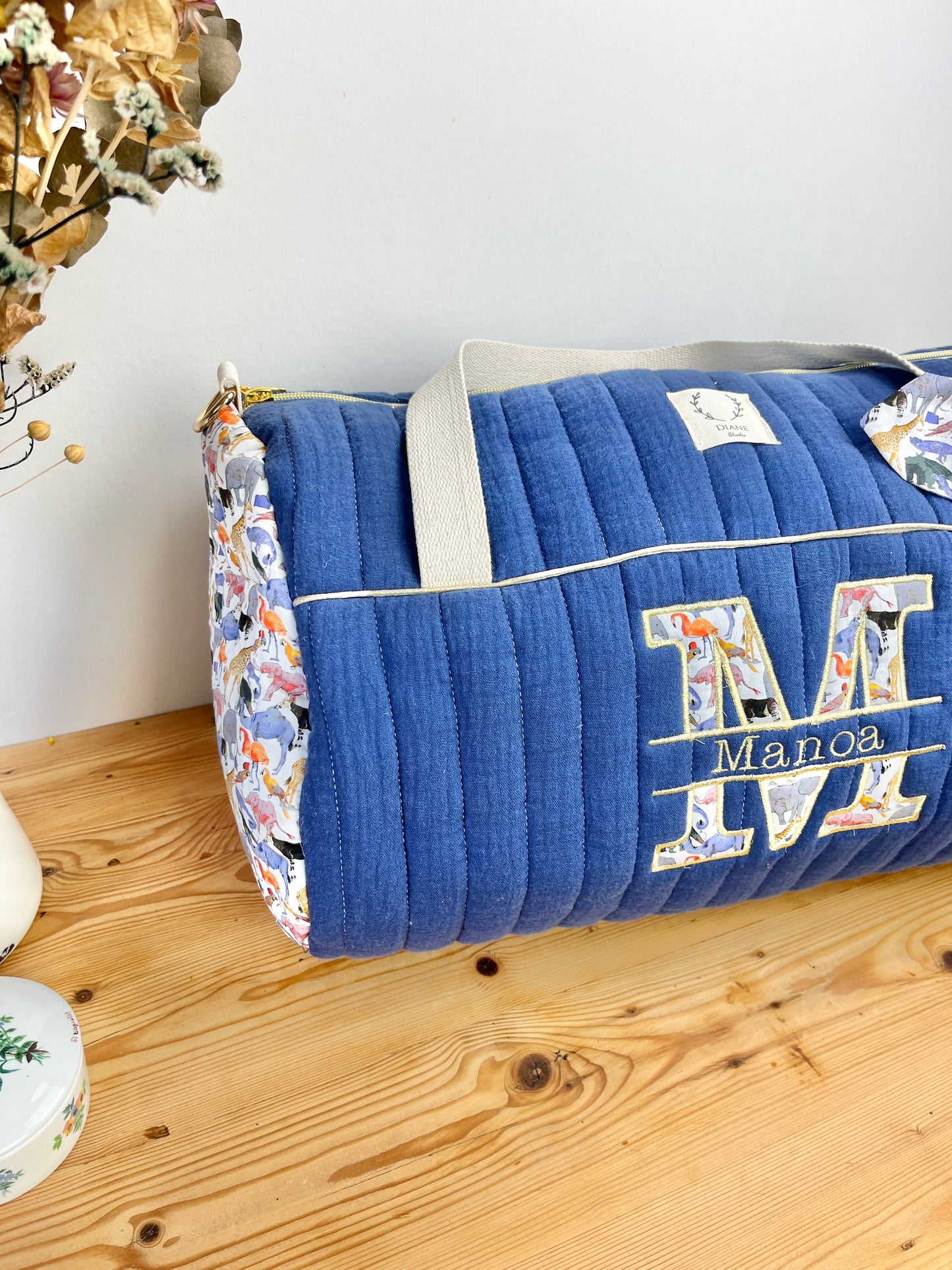 Louison le sac polochon adulte matelassé indigo et Liberty zoo