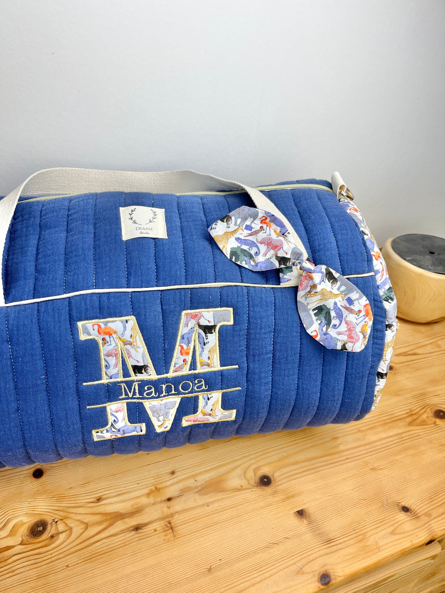 Louison le sac polochon adulte matelassé indigo et Liberty zoo