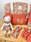 Ensemble : sac à langer, protège carnet , poupée, bloomer, et bandeau