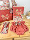 Ensemble : sac à langer, protège carnet , poupée, bloomer, et bandeau