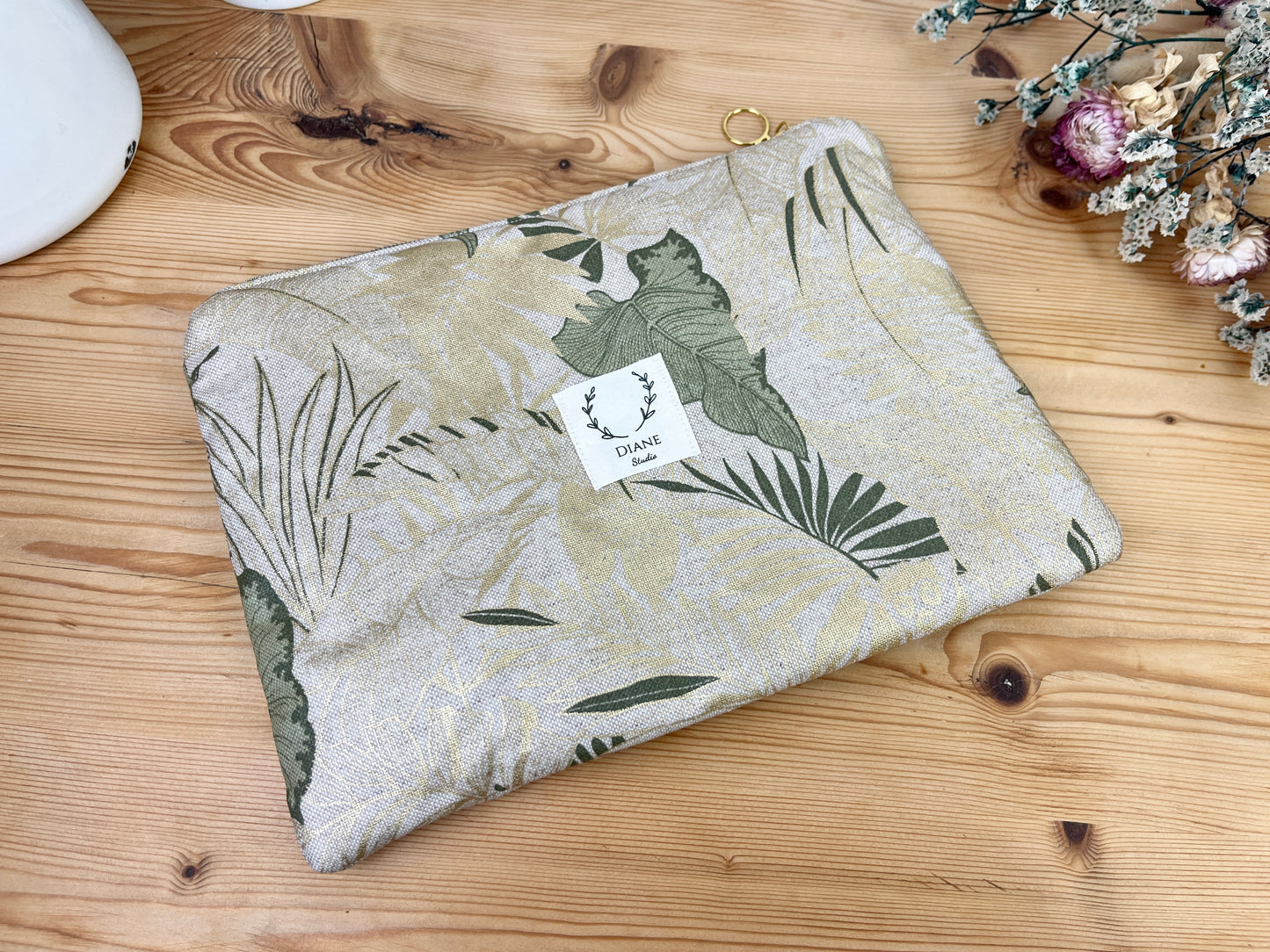 Babette la pochette plate enduite feuillage doré