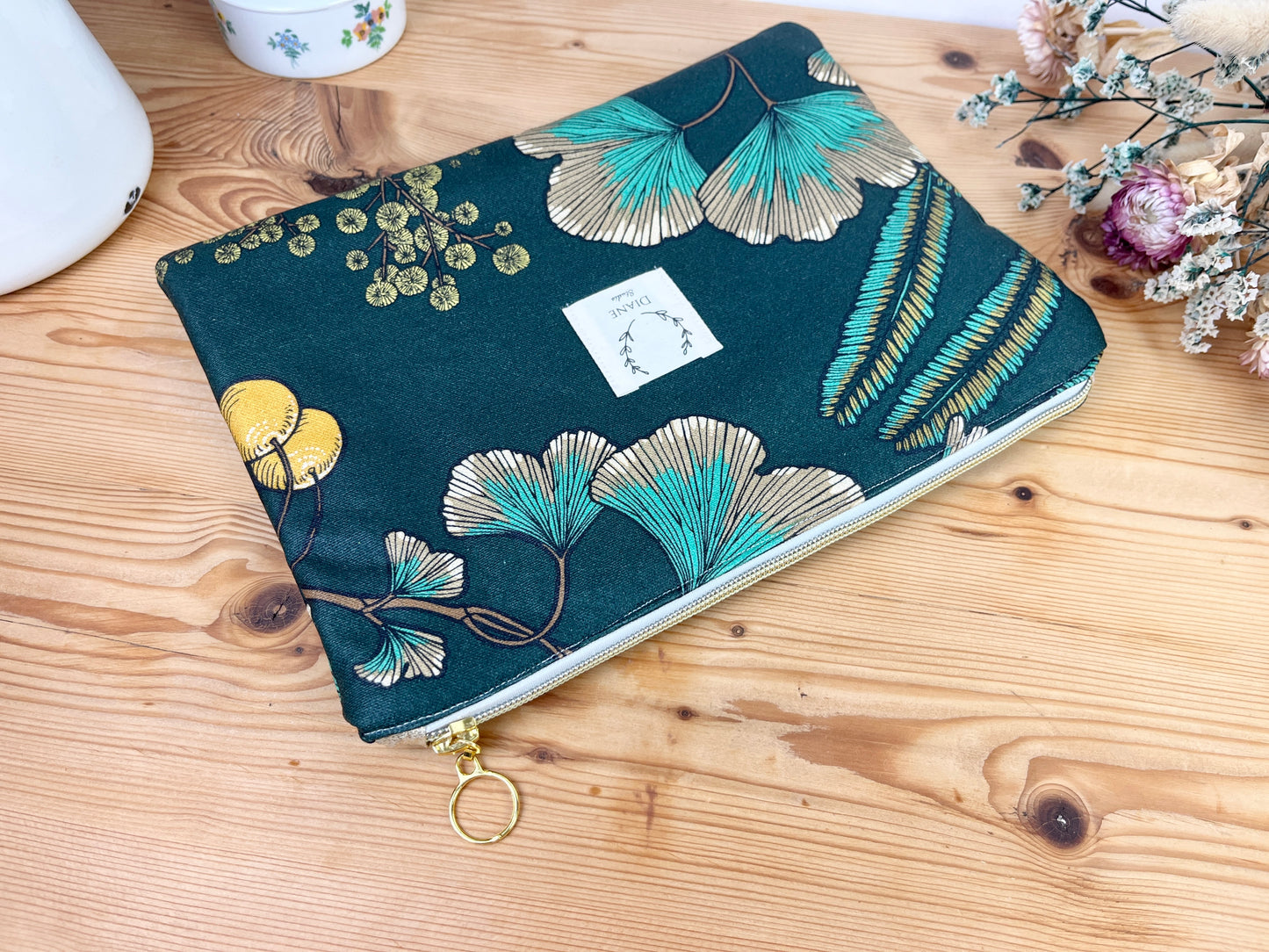 Babette la pochette plate enduite feuillage