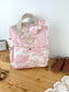 Le sac à dos enfant Ombeline gaze et jouy rose initiale dentelle