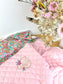 La couverture matelassé rose et margaret tutti frutti