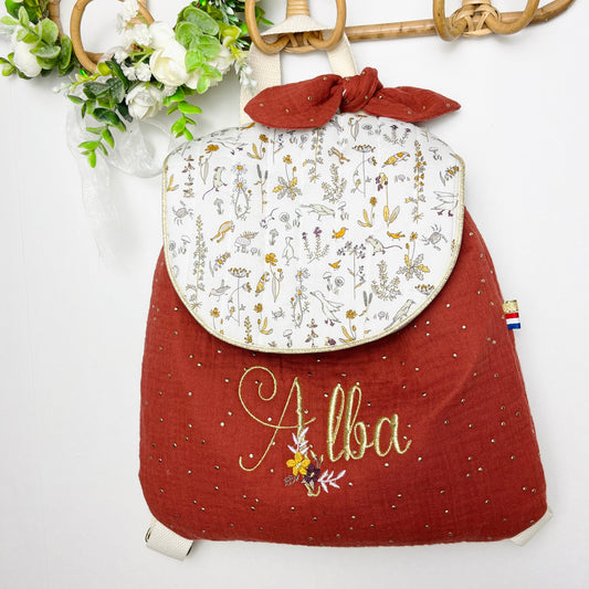 Le sac à dos enfant personnalisé Églantine Liberty théo gold et double gaze tomette doré
