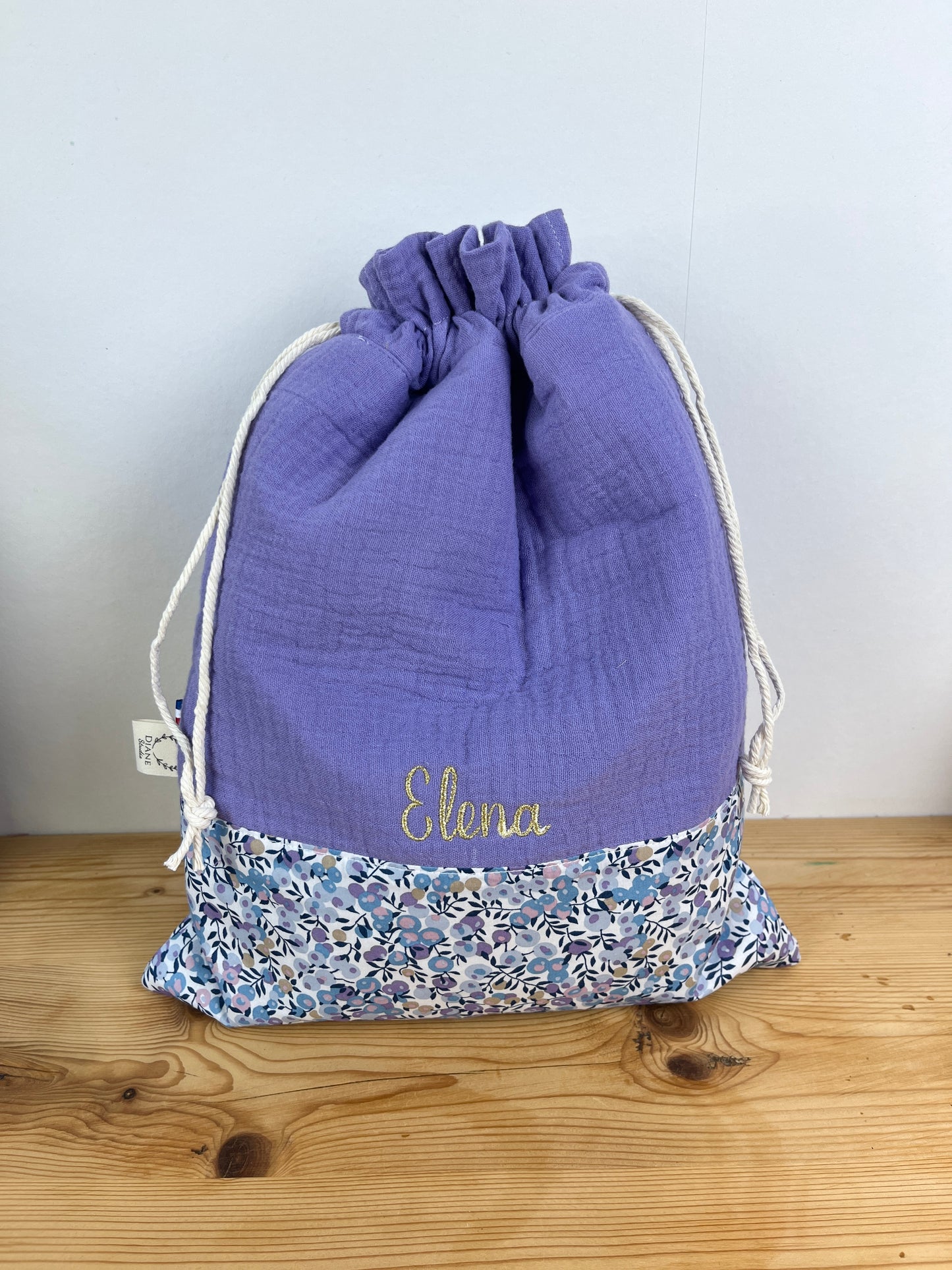 Ensemble : trousse de toilette et pochon brodé