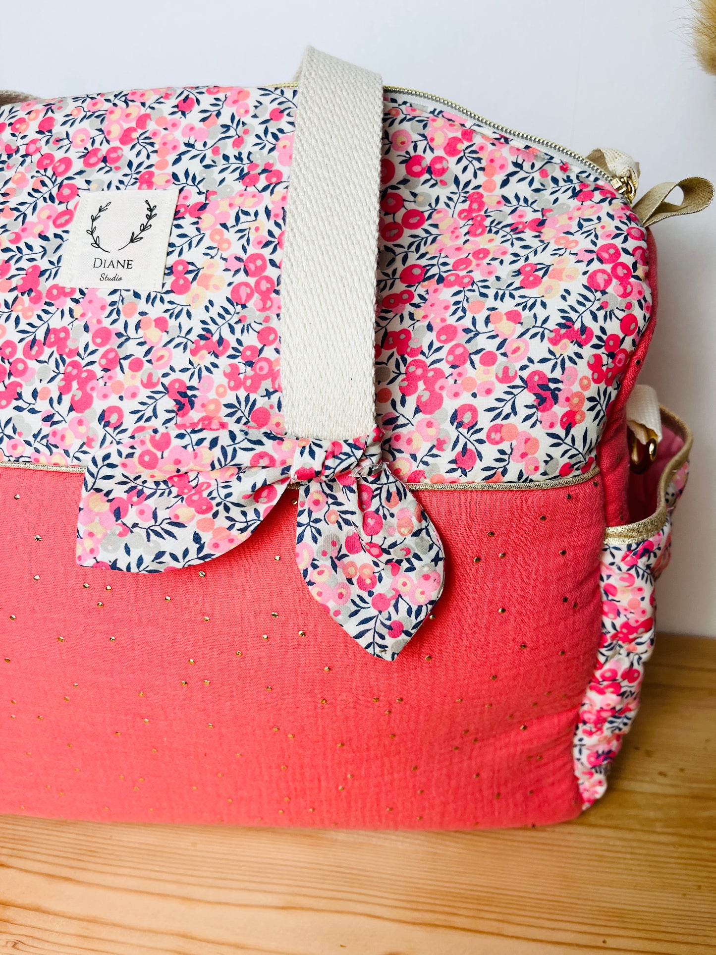 Aimé le sac à langer corail et Pois de senteur