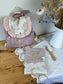 Le sac à dos Églantine velours rose poudré et jacquard roses