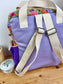 Le sac à dos enfant Ombeline gabardine lilas bloom mandarine velours violet