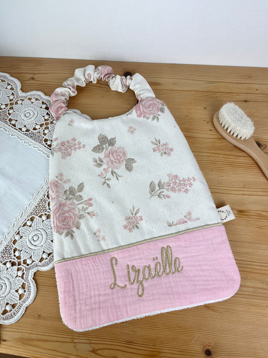 La serviette élastiquée jacquard et gaze rose