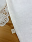 La serviette élastiquée jacquard et gaze rose