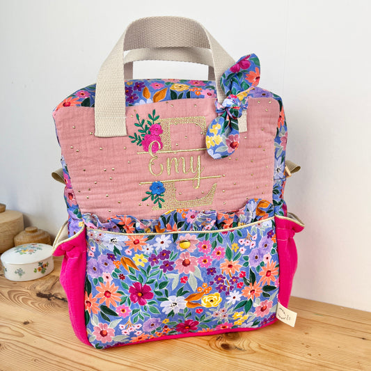 Le sac à dos enfant Ombeline personnalisé double gaze fushia et bloom