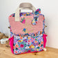 Le sac à dos enfant Ombeline personnalisé double gaze fushia et bloom