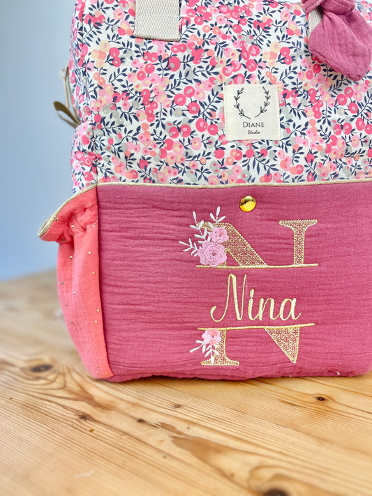Le sac à dos enfant Ombeline personnalisé double gaze framboise et liberty wiltshire pois de senteur