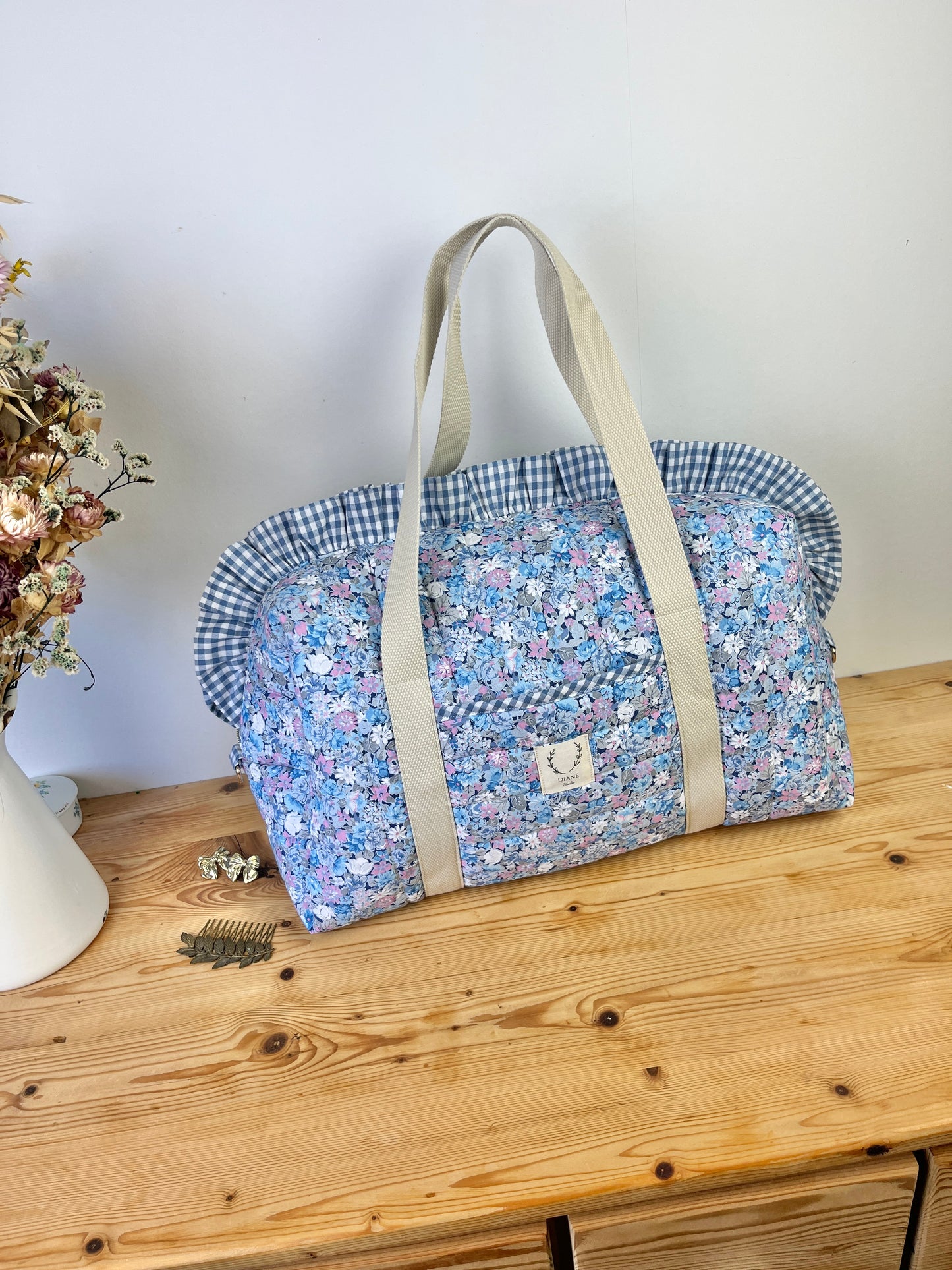 Ensemble sac et trousse de beauté volant matelassé