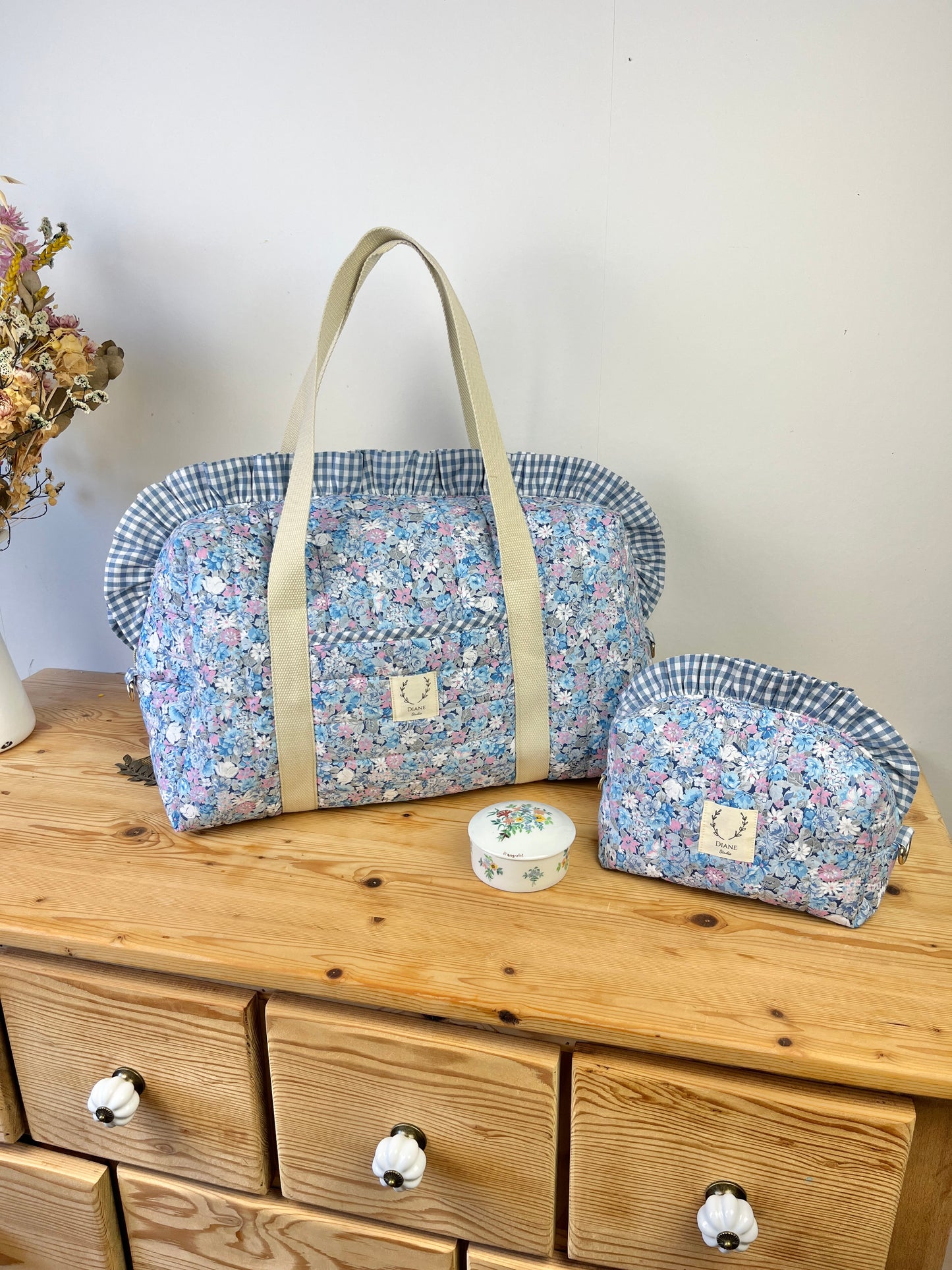 Ensemble sac et trousse de beauté volant matelassé