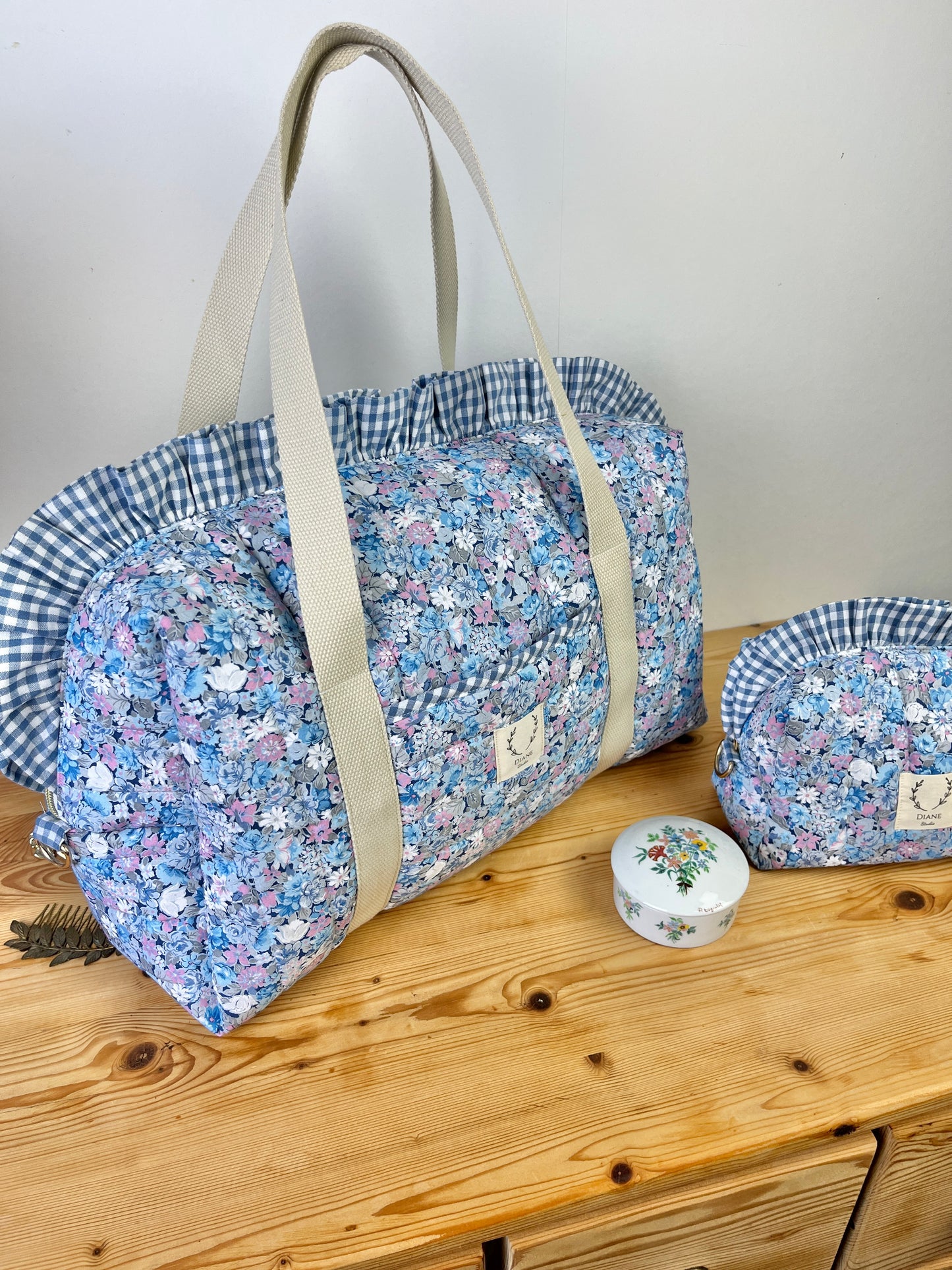 Ensemble sac et trousse de beauté volant matelassé