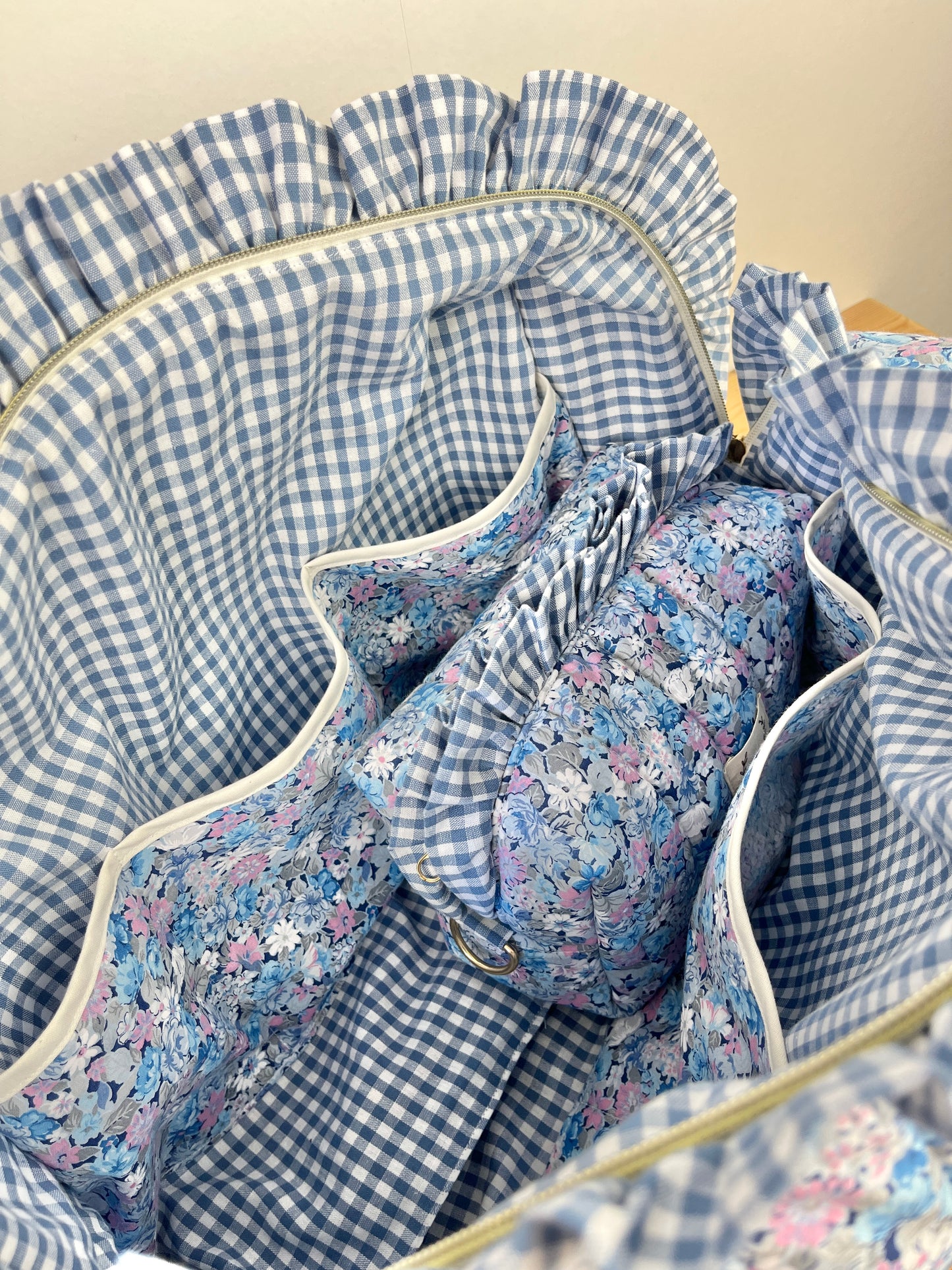 Ensemble sac et trousse de beauté volant matelassé