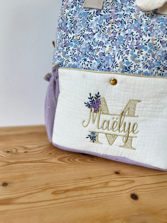 Le sac à dos enfant Ombeline poche double gaze crème et liberty wiltshire lilas