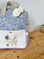 Le sac à dos enfant Ombeline poche double gaze crème et liberty wiltshire lilas